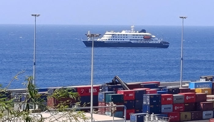 Cruise ship MV Hondius docks off Cape Verde port, as passengers were not allowed off the ship, while health authorities investigated suspected cases of hantavirus aboard the vessel, in Praia Port, Cape Verde, May 4, 2026. — Reuters