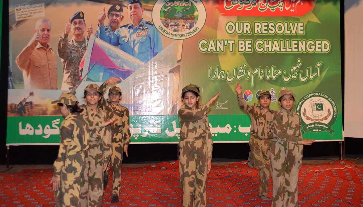 Students perform a tableau marking the completion of one year of the victory of Marka-e-Haq Bunyan-ul-Marsoos at Arts Council in Sargodha. — APP