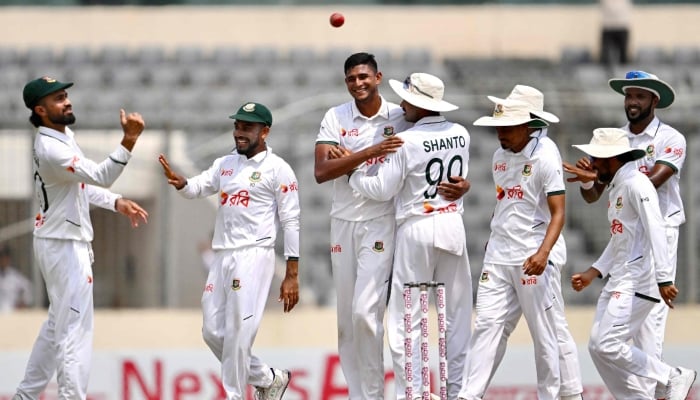 Bangladeshs players celebrate after taking a wicket during the fifth day of the first Test cricket match between Bangladesh and Pakistan at the Sher-e-Bangla National Stadium in Mirpur on May 12, 2026. — AFP
