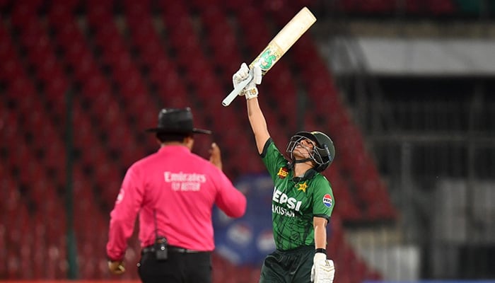 Pakistans Ayesha Zafar celebrates scoring her century during their first T20I against Zimbabwe at the National Bank Stadium in Karachi on May 12, 2026. — PCB