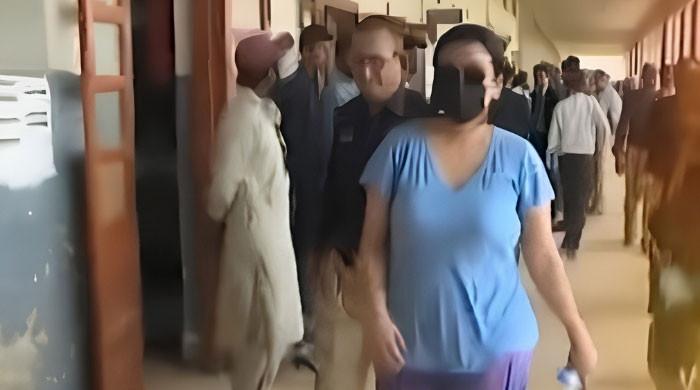 Inquiry ordered after woman ‘drug peddler' produced in court without handcuffs