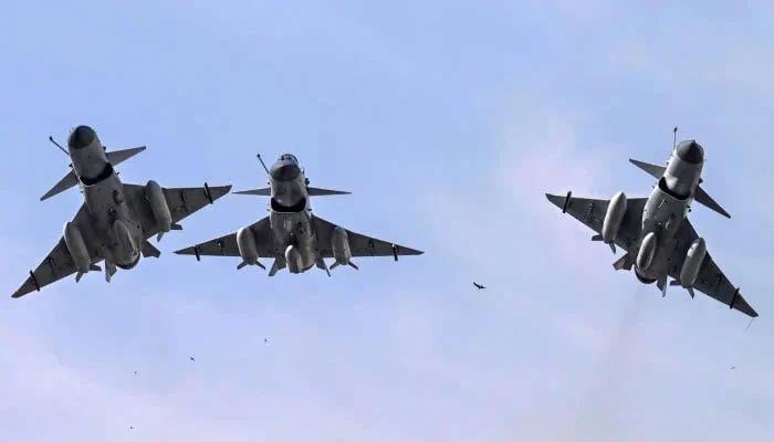 Pakistan Air Force J-10 fighter jets fly past during the national day parade in Islamabad on March 23, 2025. —AFP