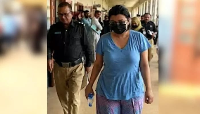 Police produce alleged drug peddler Anmol alias Pinky before a local court in Karachi on May 12, 2026. — YouTube/Geo News/screengrab