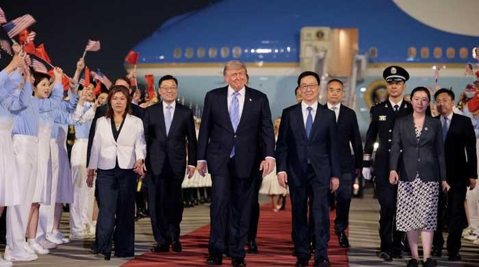 Trump lands in China for Xi summit as Tehran-Washington ceasefire teeters