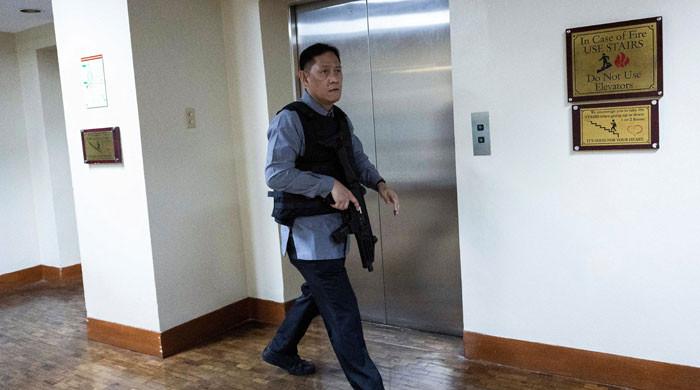 Gunshots fired in standoff at Philippine Senate over ICC suspect