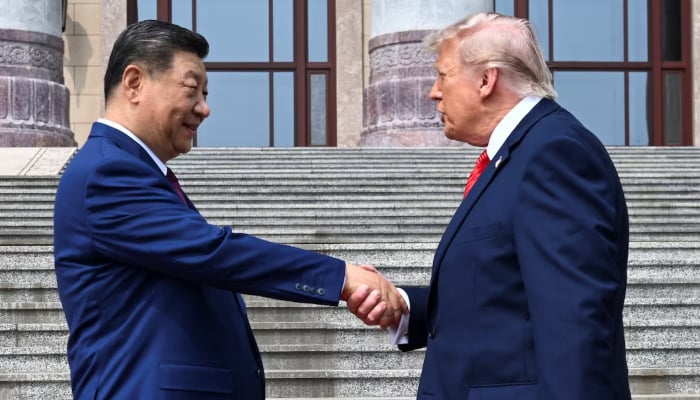 The scene as US President Donald Trump participates in events at the Great Hall of the People and does a greeting with the President of the People’s Republic of China, Xi Jinping, on May 14, 2026. — Reuters