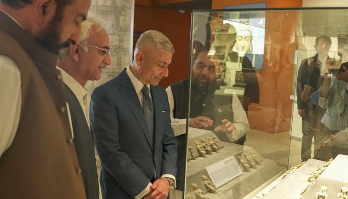 US Assistant Secretary Paul Kapur (second-left) looking at a stolen artifact recently returned to Pakistan on display in Islamabad, Pakistan, on May 13, 2026. —US Embassy in Pakistan.