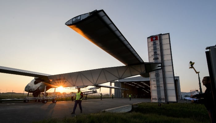 Sun-powered plane Solar Impulse 2 HB-SIB is seen during its first exit for test on April 14, 2014, in Payerne, a year ahead of their planned round-the-world flight. — AFP