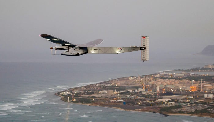 The Solar Impulse 2 solar-powered aeroplane flies off Kapolei, Hawaii, on March 3, 2016, on an all-day test flight. — AFP