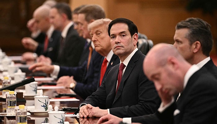 Secretary of State Marco Rubio (C) looks on next to US President Donald Trump (2nd L) as they meet with Chinas President Xi Jinping at the Great Hall of the People in Beijing on May 14, 2026. — AFP