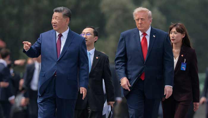 US President Donald Trump and Chinese President Xi Jinping tour the Temple of Heaven in Beijing, China, May 14, 2026. — Reuters
