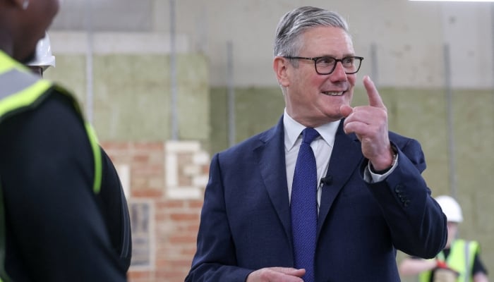 Britains Prime Minister Keir Starmer meets construction apprentices during a visit to London South Bank Technical College in London, Britain, May 12, 2026. — Reuters