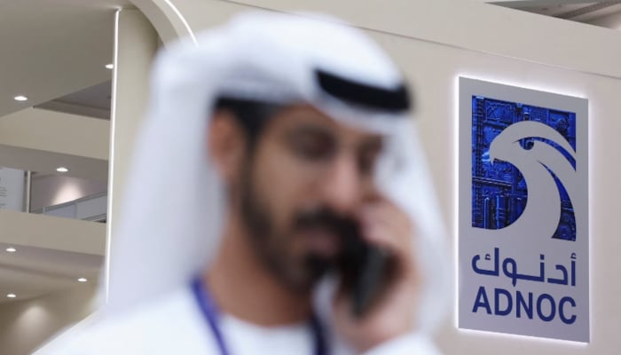 A logo of ADNOC is displayed at the Make it in the Emirates (MIITE) conference, in Abu Dhabi, United Arab Emirates, May 4, 2026. — Reuters
