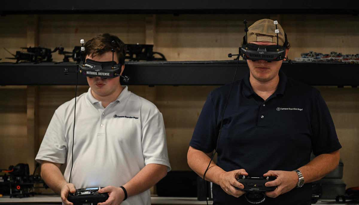 Pilots operate drones during a demonstration of a school shooter take down, at the headquarters of the startup Campus Guardian Angel on May 8, 2026, in Austin, Texas. — AFP