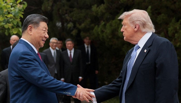US President Donald Trump shakes hands with Chinese President Xi Jinping while leaving after a visit to the Zhongnanhai Garden in Beijing, China, May 15, 2026. — Reuters