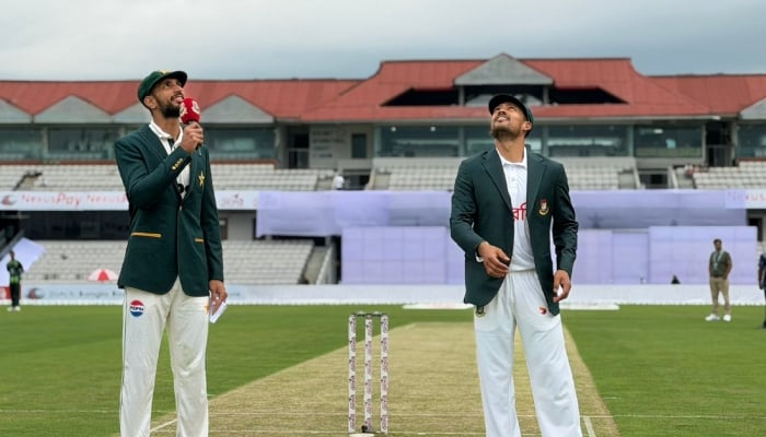 Pakistan captain Shan Masood (left) makes the call as Bangladesh captain Najmul Hossain Shanto flips the coin at the toss for the second Test at Sylhet International Cricket Stadium on May 16, 2026. — PCB
