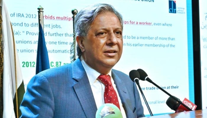 Law Minister Azam Nazeer Tarar addresses a Labour Day conference in Islamabad, May 1, 2025. — APP
