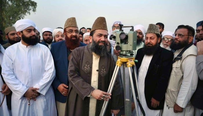 Central Ruet-e-Hilal Committee Chairman Molana Abdul Khabir Azad, along with committee members, sights Ramadan moon at Eidgah in Peshawar, February 18, 2026. — Online