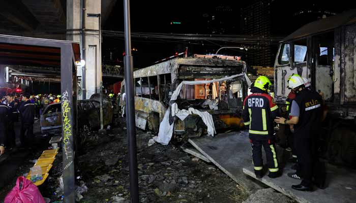 Emergency services work at a site where a train collided with a bus and several cars on Asok-Din Daeng Road, causing several casualties, in Bangkok, Thailand, May 16, 2026.— Reuters/File