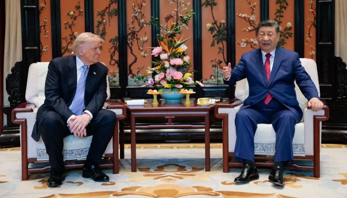 US President Donald Trump and Chinese President Xi Jinping meet on the sidelines of a visit to Zhongnanhai Garden on May 15, 2026 in Beijing, China. — Reuters