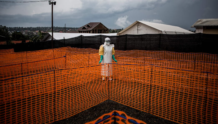 A health worker waits to handle a new unconfirmed Ebola patient at a newly built MSF (Doctors Without Borders) supported Ebola treatment centre (ETC) on November 7, 2018, in Bunia, Democratic Republic of the Congo. — AFP