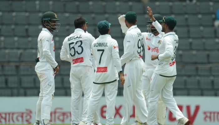 Bangladeshi players celebrate after taking a wicket during the second day of the second Test cricket match between Bangladesh and Pakistan  at the Sylhet International Cricket Stadium on May 17, 2026. — BCB