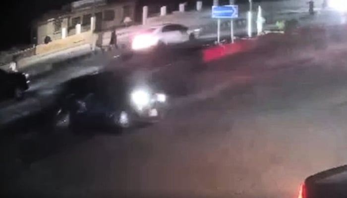 This image shows a speeding double-cabin vehicle hitting a car near Seaview in Karachi on May 14, 2026. — Screengrab via Geo News