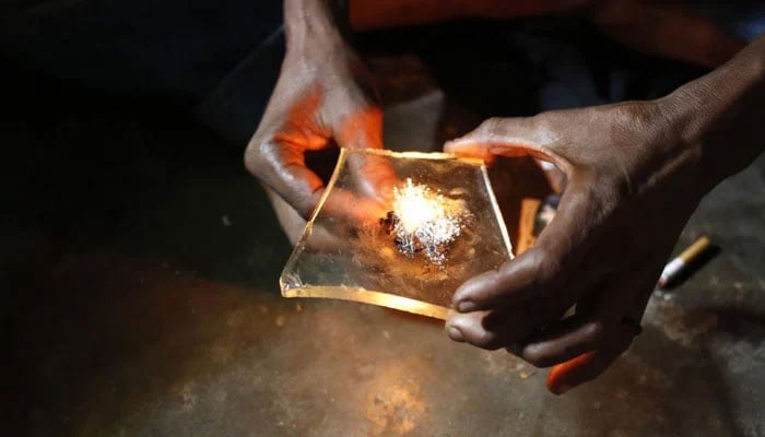 This representational image shows a heroin addict prepares heroin before using it in Lamu November 21, 2014. — Reuters