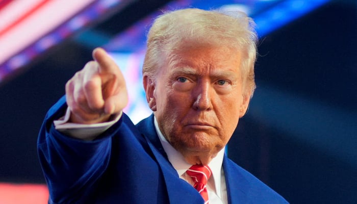 Donald Trump gestures at Turning Point USAs AmericaFest in Phoenix, Arizona, US, December 22, 2024. — Reuters