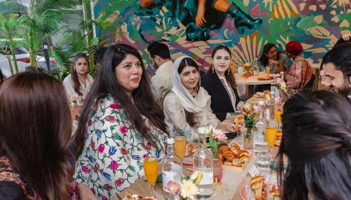 Girls education activist Malala Yousufzai speaks in a round-table group of influential Pakistanis. — Betty Laura Zapata for Malala Fund