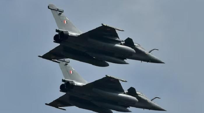 Military jets' crew members safely eject after Idaho air-show collision