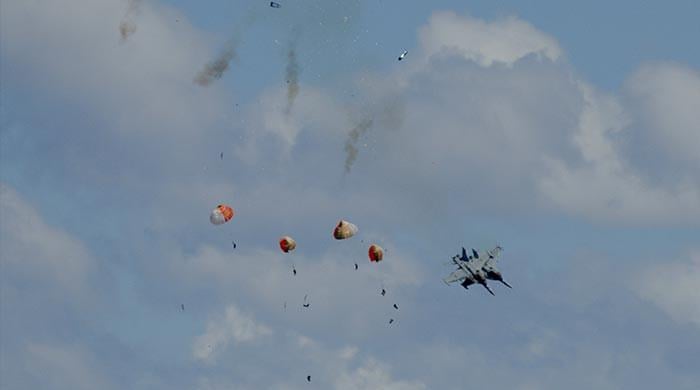 Military jets' crew members safely eject after Idaho air-show collision