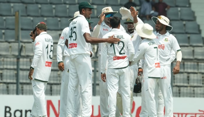 Bangladeshi players celebrate after taking a wicket against Pakistan in the second Test at Sylhet International Cricket Stadium on May 19, 2026. — BCB