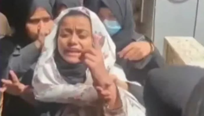 Police produce alleged drug peddler Anmol alias Pinky before a local court in Karachi on May 16, 2026. — YouTube/Geo News/screengrab