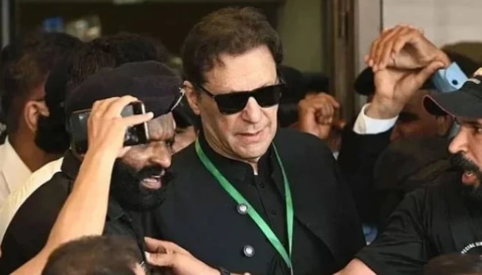 PTI founder Imran Khan leaves after appearing in the Supreme Court in Islamabad on July 24, 2023. — AFP