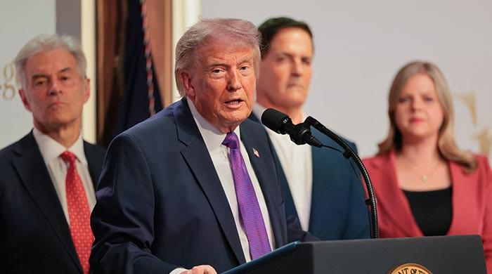 Trump says held off on new Iran attack, upbeat for agreement
