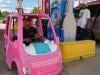 High gas prices spur Americans to improvise, from bus rides to toy cars 