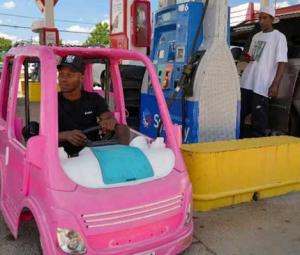 High gas prices spur Americans to improvise, from bus rides to toy cars 