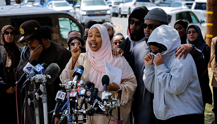 Hawaa Abdullah, the daughter of security guard Amin Abdullah, who was killed in a shooting incident, speaks during a press conference, near the Islamic Centre of San Diego, the day after the shooting incident, in San Diego, California, US, on May 19, 2026. — Reuters