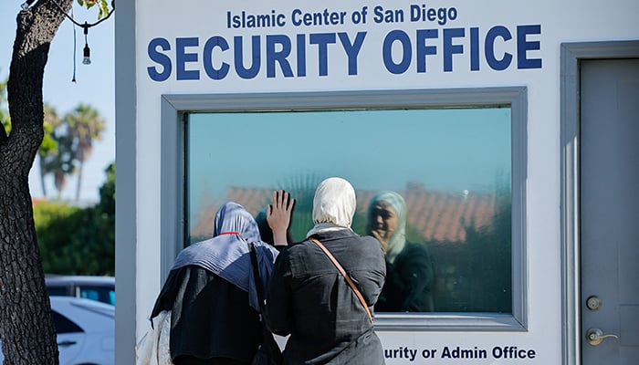Mourners react by the Security Office at the Islamic Centre of San Diego, which was used by Security guard Amin Abdullah who was fatally shot, the morning following a shooting, in San Diego, California, US May 19, 2026. — Reuters