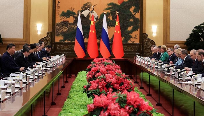 Russian President Vladimir Putin and Chinese President Xi Jinping attend a bilateral meeting at the Great Hall of the People in Beijing, China May 20, 2026. — Reuters