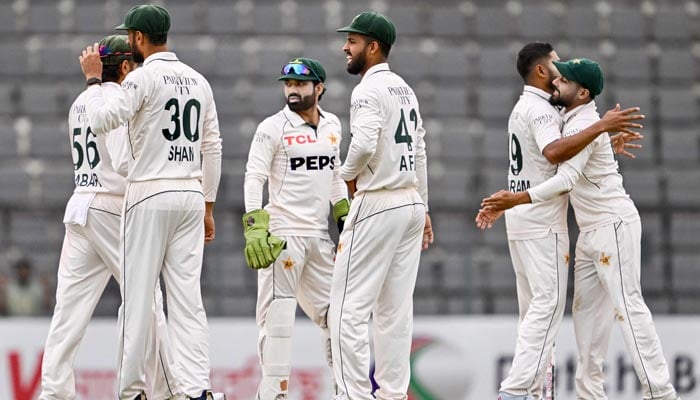 Pakistan players celebrate after the dismissal of Bangladesh Najmul Hossain Shanto during the third day of the second Test cricket match between Bangladesh and Pakistan at the Sylhet International Cricket Stadium in Sylhet on May 18, 2026. — AFP