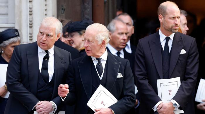Andrew returns to spoil royal wedding as bombshell documents released