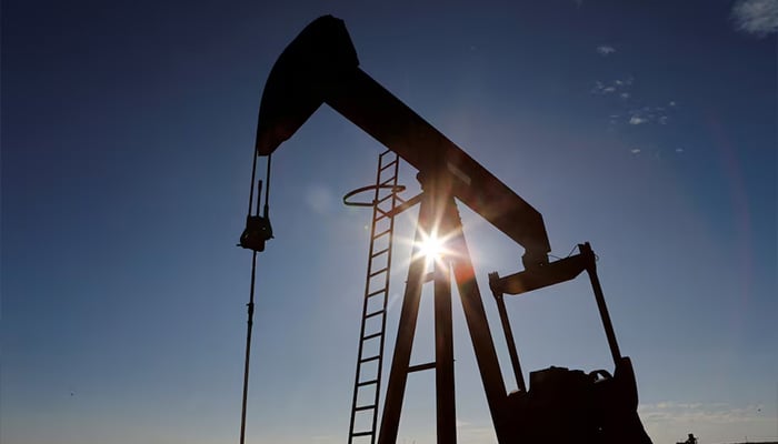The sun is seen behind a crude oil pump jack in the Permian Basin in Loving County, Texas, US, November 22, 2019. — Reuters
