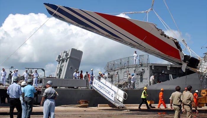 Debris of the Air France flight 447, recovered from the Atlantic Ocean, arrives at Recifes port on June 14, 2009. An Air France Airbus 330 crashed into the sea on June 1 en route from Brazil to Paris, killing all 228 aboard. — Reuters
