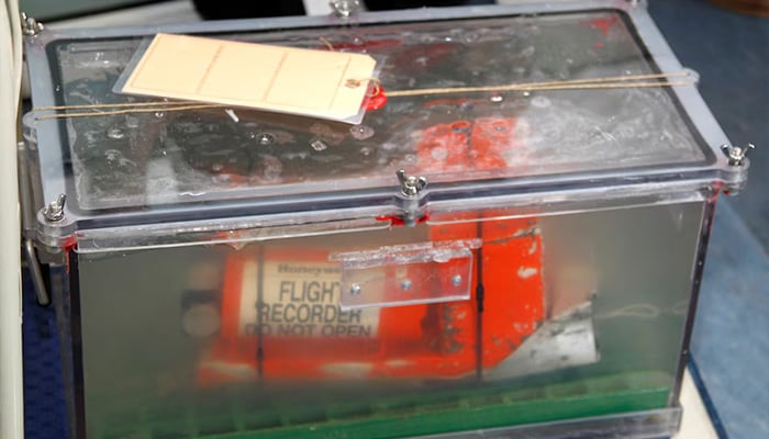 The Cockpit Voice Recorder (CVR), one of two flight recorders from the Rio-Paris Air France flight which crashed in 2009, is carrying to be displayed for the media before a news conference at the BEA headquarters in Le Bourget, northern Paris, May 12, 2011. — Reuters