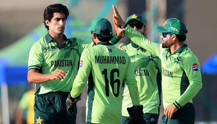 Pakistans Naseem Shah (left) celebrates taking a wicket with teammates during the ICC Mens Champions Trophy match against New Zealand at the National Bank Stadium in Karachi on February 19, 2025. — Reuters