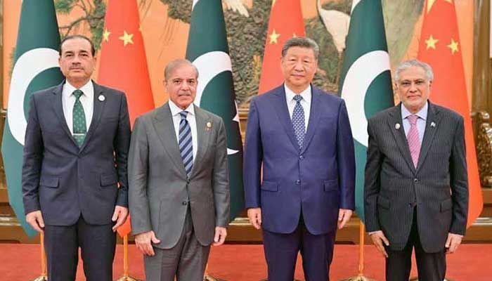 Left to right: Field Marshal Asim Munir, PM Shehbaz Sharif, President Xi Jinping and DPM Ishaq Dar pose for a photo at the Great Hall of the People in Beijing. — APP/File