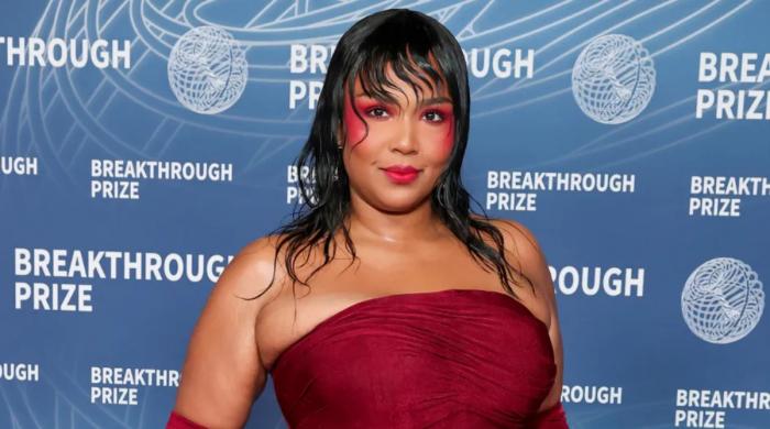 Why is Lizzo's Instagram username 'LizzoBeEating'?