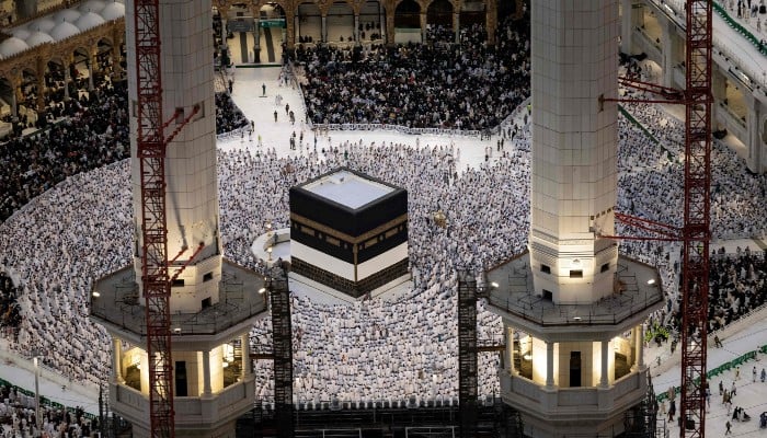 Muslim worshippers pray around the Kaaba, Islams holiest shrine, at the Grand Mosque in the holy city of Mecca, ahead of the annual Hajj pilgrimage, Saudi Arabia, June 13, 2024. — AFP